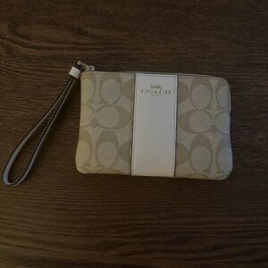 Coach Corner Zip Wristlet In Signature Canvas With Stripe